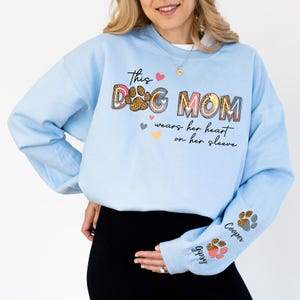 This Dog Mom Wears Her Heart on Her Sleeve Sweatshirt with Pet Name on Sleeve, Custom Dog Mom Sweater, Custom Valentine day Gift for Dog Mom