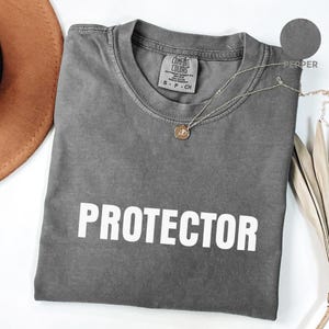 Koszulka Protector Vintage Cowboy Comfort Colors®, koszulka Western, koszulka Western Bachelorette, koszula retro cowboy, koszulki dla zabawy