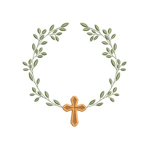 May include: A gold-coloured cross is positioned beneath a circular wreath of green leaves. The leaves are detailed with light green embroidery. The cross has a textured design against a white background.