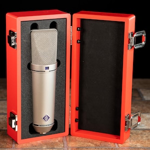 May include: A rustic wooden sign with the text "Welcome to our home" in white lettering. The sign features a distressed finish and a simple, inviting design, perfect for a front porch or entryway.