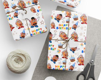 May include: Gift-wrapped presents with white wrapping paper featuring a repeating pattern of cartoon characters, birthday cakes, stars, and the words "Happy Birthday." The gifts are tied with twine and have blank heart-shaped tags.