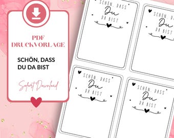 May include: Printable PDF template with four blank cards. Each card features the text "SCHÖN. DASS Du DA BIST" with hearts and a decorative border.