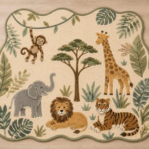 May include: A cream-colored area rug with a scalloped edge featuring a jungle theme. The design includes a brown monkey hanging from a vine, a gray elephant, a brown lion, a yellow and brown giraffe, and a tiger, all surrounded by green leaves.