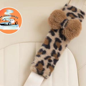 Funda de cinturón de seguridad con estampado de leopardo / Cojín de hombro de felpa suave / Envoltura esponjosa con lazo / Accesorio femenino para coche / Decoración cómoda para el vehículo