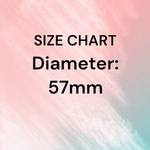 May include: Size chart for a round object with a diameter of 57mm.