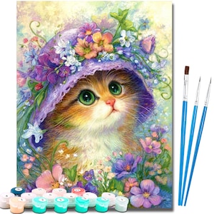 May include: A paint-by-numbers kit depicting a kitten in a floral hat, set amongst vibrant flowers. The kit includes paint pots, brushes, and a canvas. The kitten has green eyes and a sweet expression. The colour scheme features pink, purple, and blue.