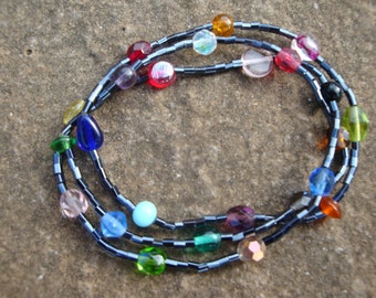 Rainbow glass beaded sparkly bracelet - eclectic mix of colourful vintage, up-cycled and new beads