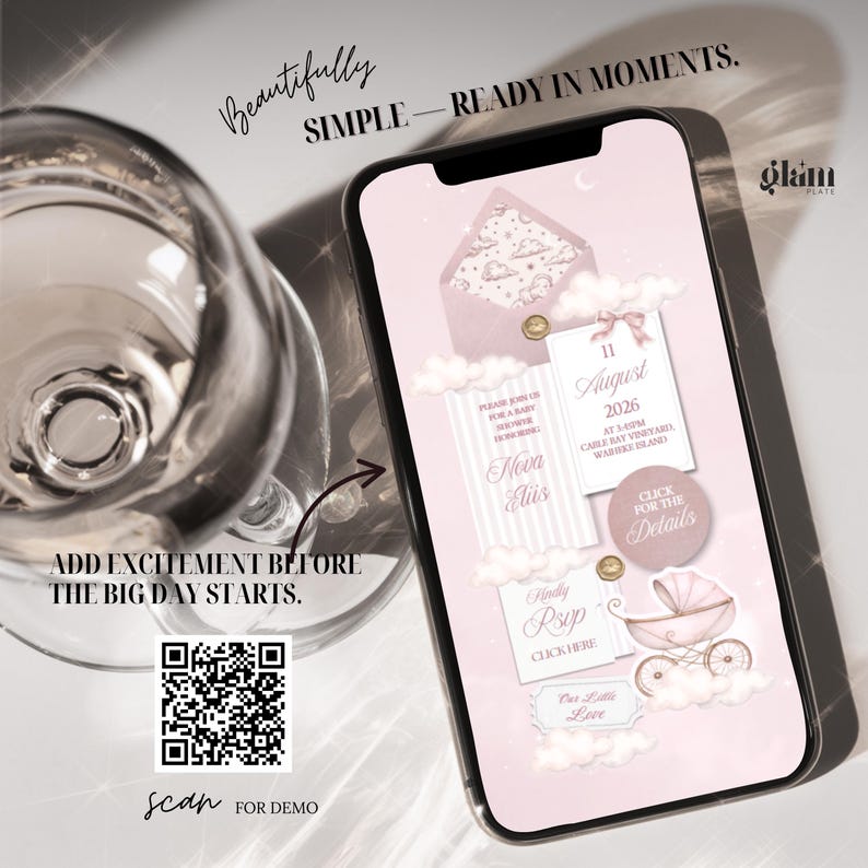 May include: A smartphone displays a baby shower invitation with a pink and white design. The invitation includes the date, time, and location. Text on the screen reads "Nova El&uuml;s", "RSVP", and "Click for the Details". The image also includes a QR code.