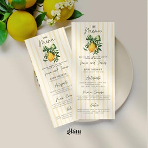 May include: Two menu cards with a lemon theme. The cards have a vertical striped pattern in yellow and white. Each card features the text "The Menu" and a lemon illustration with a green bow. The menu includes Antipasti, Main Course, and Dolci.