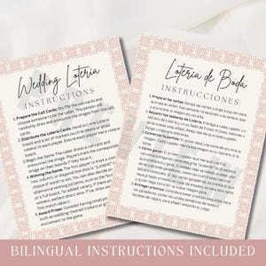 May include: Two cards with instructions for a wedding Loteria game. The cards have a pink floral border and text in English and Spanish. The instructions explain how to play the game, including preparing cards and awarding prizes.