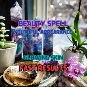 May include: An image featuring several tall, colorful crystal towers with purple, blue, and white hues. The text on the image reads "BEAUTY SPELL, YOUTHFUL APPEARANCE, GLOWING SKIN, FAST RESULTS." A small plant and orchids are also visible.