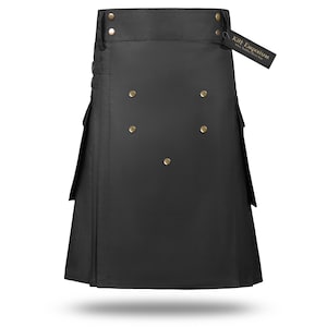 May include: Black utility kilt with gold buttons and two large pockets. Kilt Emporium label is attached.
