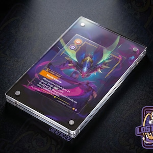May include: A clear acrylic magnetic card holder containing a game card titled Voidreaver, featuring a purple and green creature illustration, text, and icons. The holder is secured with four silver corner screws and displays the text CARD NOT INCLUDED.