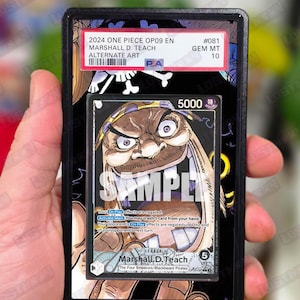 May include: A PSA graded 2024 One Piece OP09 EN Marshall D. Teach alternate art trading card in a black plastic slab. The card features a character illustration with the text Marshall D. Teach, 5000 power, and a special symbol in the corner.