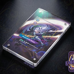 May include: A rectangular clear acrylic display case holding a trading card featuring a character with long white hair and the text Scorn of the Moon. The case is secured with four silver metal screws at the corners and displays a card with purple and blue accents.