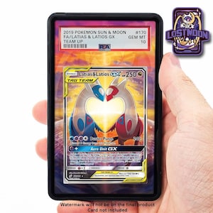 May include: A Pokémon trading card featuring Latias & Latios GX, from the 2019 Sun & Moon Team Up set. The card is graded GEM MT 10 and encased in a protective holder. The card art depicts two stylized creatures in blue and red.