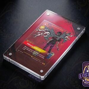 May include: A clear acrylic magnetic card display case featuring a red background insert. The case holds a trading card titled Piltover Enforcer, which depicts a character with a multi-headed creature and includes text and a signature.