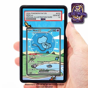 May include: A Pokémon trading card featuring Mew ex, a special illustration rare, graded GEM MT 10. The card is in a black holder. The card has a blue and white design with the text "Mew ex" and "Genome Hacking". A "Lost Moon" pin is also visible.
