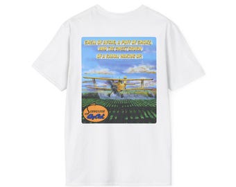 May include: White t-shirt featuring a graphic of a yellow biplane spraying a field, with text that reads "SMELL OF AVGAS, A PUFF OF SMOKE, AND THE SWEET CHURN OF A RADIAL WAKING UP." The shirt also has the logo "Schweizer by Out."