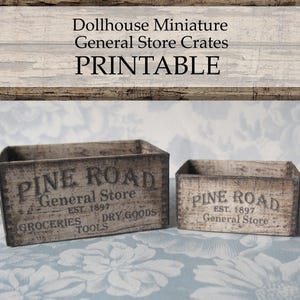 May include: Two weathered wooden crates labeled "Pine Road General Store" with the text "Printable" above. The crates are rectangular, with the larger one on the left and the smaller one on the right. The text "EST. 1897" is also visible.