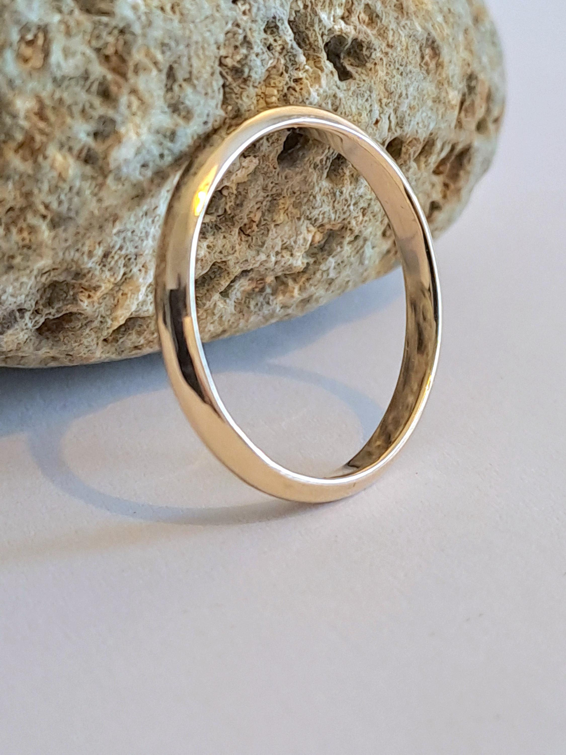 Court section, 2mm wide wedding ring in recycled 9ct yellow gold.