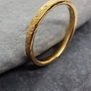 Recycled 22ct yellow gold wedding band with diamonds