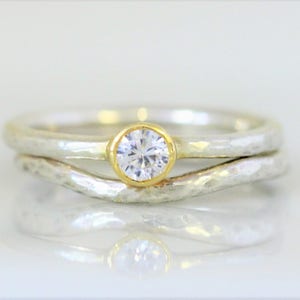 9 ct recycled white gold wedding and engagement set with 4mm diamond, in yellow gold setting. 2 mm wide. image 1