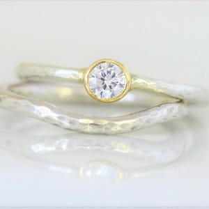 9 ct recycled white gold wedding and engagement set with 4mm diamond, in yellow gold setting. 2 mm wide. image 2