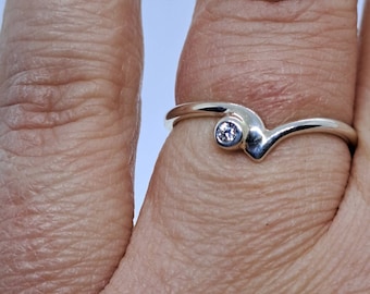 Recycled 9ct white gold curved wishbone /wave ring with diamond