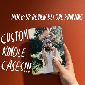 May include: Custom Kindle case featuring a photograph of a man and a child. The case is held against an orange background. Text on the case reads "MOCK-UP REVIEW BEFORE PRINTING" and "CUSTOM KINDLE CASES!!!".