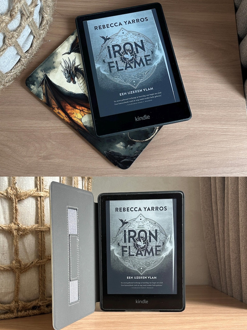 May include: A black Kindle e-reader displaying the book "Iron Flame" by Rebecca Yarros. The cover features a stylized design with the title in large letters. The e-reader rests on a decorative case with a dragon illustration.
