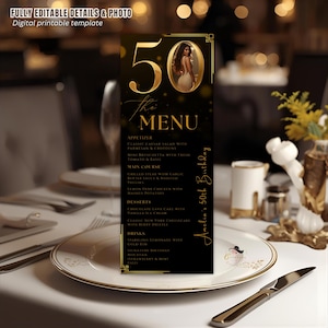 May include: A black and gold menu card for a 50th birthday celebration. The card features the number "50" in gold, the word "MENU", and a photo of a woman. The menu lists appetizers, main courses, desserts, and drinks.