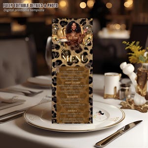 May include: A digital printable menu card with a leopard print background. The menu features a photo of a woman and gold balloons. The menu includes appetizers, main courses, desserts, and drinks. The text "MENU" is prominently displayed.