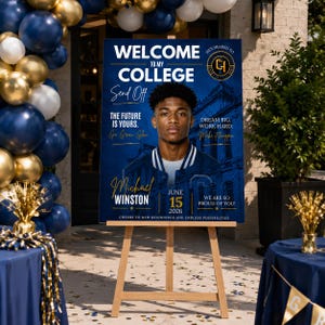May include: A rectangular college send-off sign on a wooden easel featuring a portrait of a young person in a blue varsity jacket. The blue background includes text: Welcome to my college, Michael Winston, June 15 2026, and inspirational quotes.