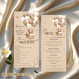 May include: A baby shower program and menu card set featuring a teddy bear hot air balloon design. The program details the event schedule, and the menu lists appetizers, main course, desserts, and drinks. The cards are beige with brown and white accents.