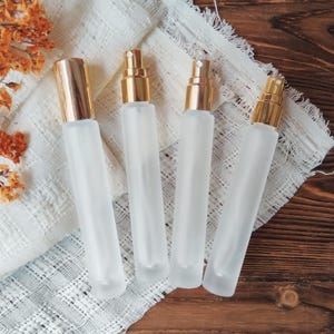 Minibotellas de vidrio con atomizador de 10 ml, rellenables, de niebla fina, portátiles, para viaje, con recarga a granel.