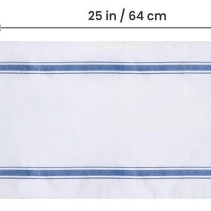 Size diagram of the white bread tea towel with blue stripes, measuring 25 inches / 64 cm wide by 15 inches / 38 cm tall.