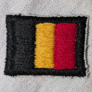 Mini-påsydd lapp med belgisk flagga