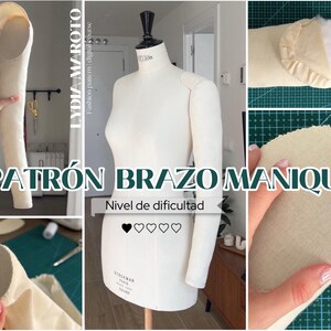 Könnte beinhalten: Eine weiße Schneiderpuppe mit schwarzem Hals und Armform. Das Bild enthält den Text "PATRÓN BRAZO MANIQUÍ" und "LYDIA MAROTO Fashion pattern digital course". Der Schwierigkeitsgrad wird durch Herzen angezeigt.