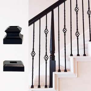 May include: Two black metal square baluster shoes with a tapered design and a central square opening, shown alongside a staircase railing featuring black metal balusters with twisted basket details and a smooth black wooden handrail.