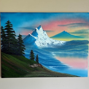 Bob Ross inspired mountain, and water scene on 18 x 24 stretched canvas.