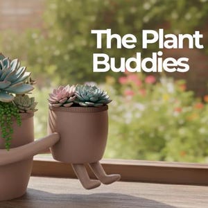 May include: Two whimsical, light brown plant pots shaped like figures, each holding succulents. One pot has arms, the other has legs. The succulents are various shades of green and pink. The text "The Plant Buddies" is displayed in white.