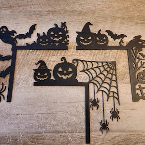 May include: Black Halloween-themed corner decorations featuring pumpkins, bats, spiders, ghosts, and a spiderweb. These decorative pieces are designed to be placed in corners, adding a spooky touch to any Halloween display.