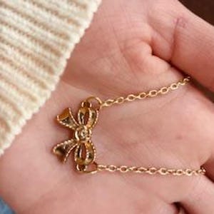 Gold Bow Pendant Necklace