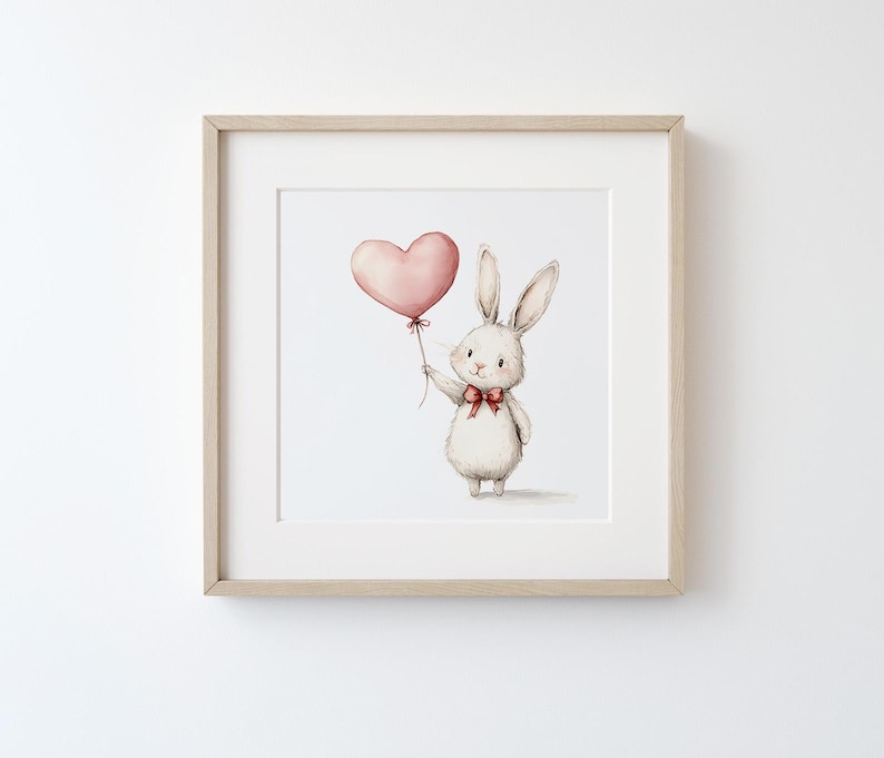 Puede incluir: Un conejo blanco sosteniendo un globo rosa en forma de coraz&oacute;n con un lazo rojo. El conejo est&aacute; de pie sobre un fondo blanco.
