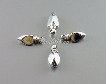 May include: Four silver-toned metal teardrop-shaped pendant charms with a loop at the top for attaching to a necklace or bracelet.
