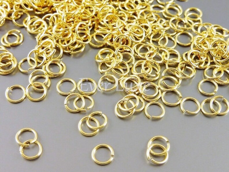 10 grams delicate 24 gauge 4mm gold plated brass jumprings, jump rings, connectors B005BBG-244 