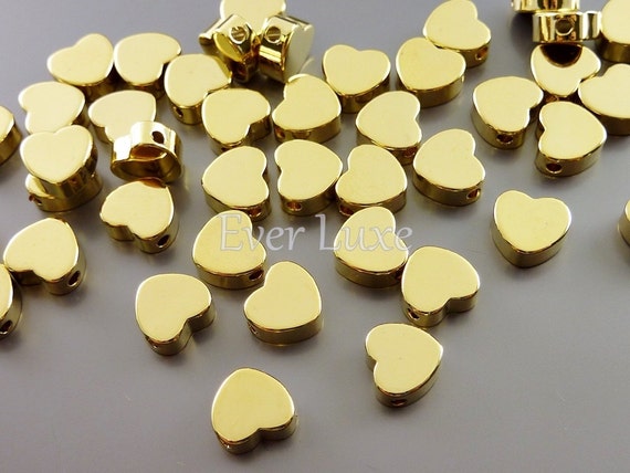 Shiny Gold Heart Beads: 7mm Brass Charm Spacers (4 pc)