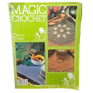 May include: A vintage issue of Magic Crochet magazine, featuring a green and brown crocheted doily on a woven surface. The magazine cover also includes a photo of a crocheted placemat and a woman crocheting.