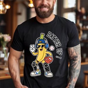 Bate de béisbol de plátano genial PNG, divertido receptor de fruta PNG, divertido plátano gangsta con bate y pelota, mascota de equipo deportivo, divertido plátano